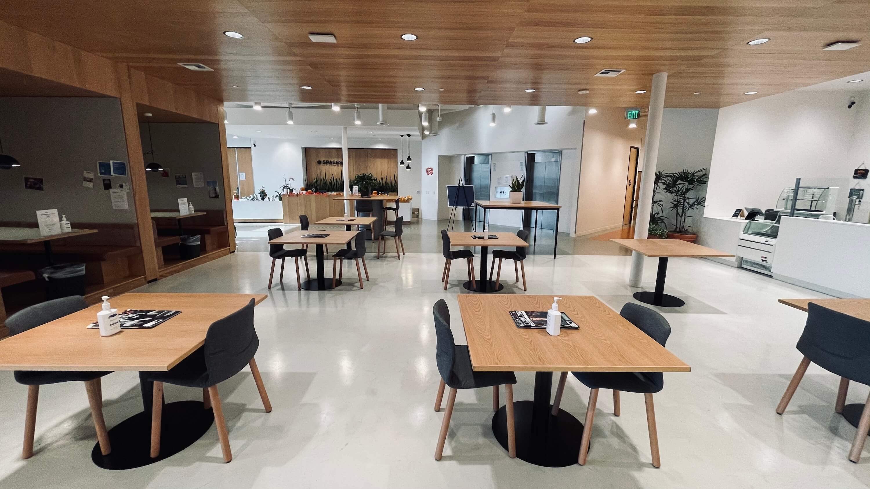 Cafe seating area on the Main Floor at 1800 Vine St near the reception lobby