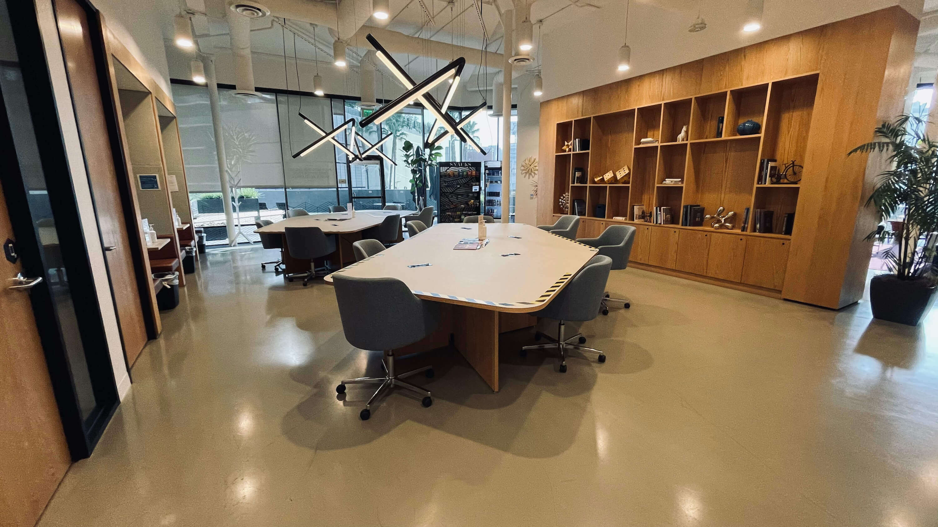 Common area on the Main Floor at 1800 Vine St with booth seating and wood-paneled ceiling