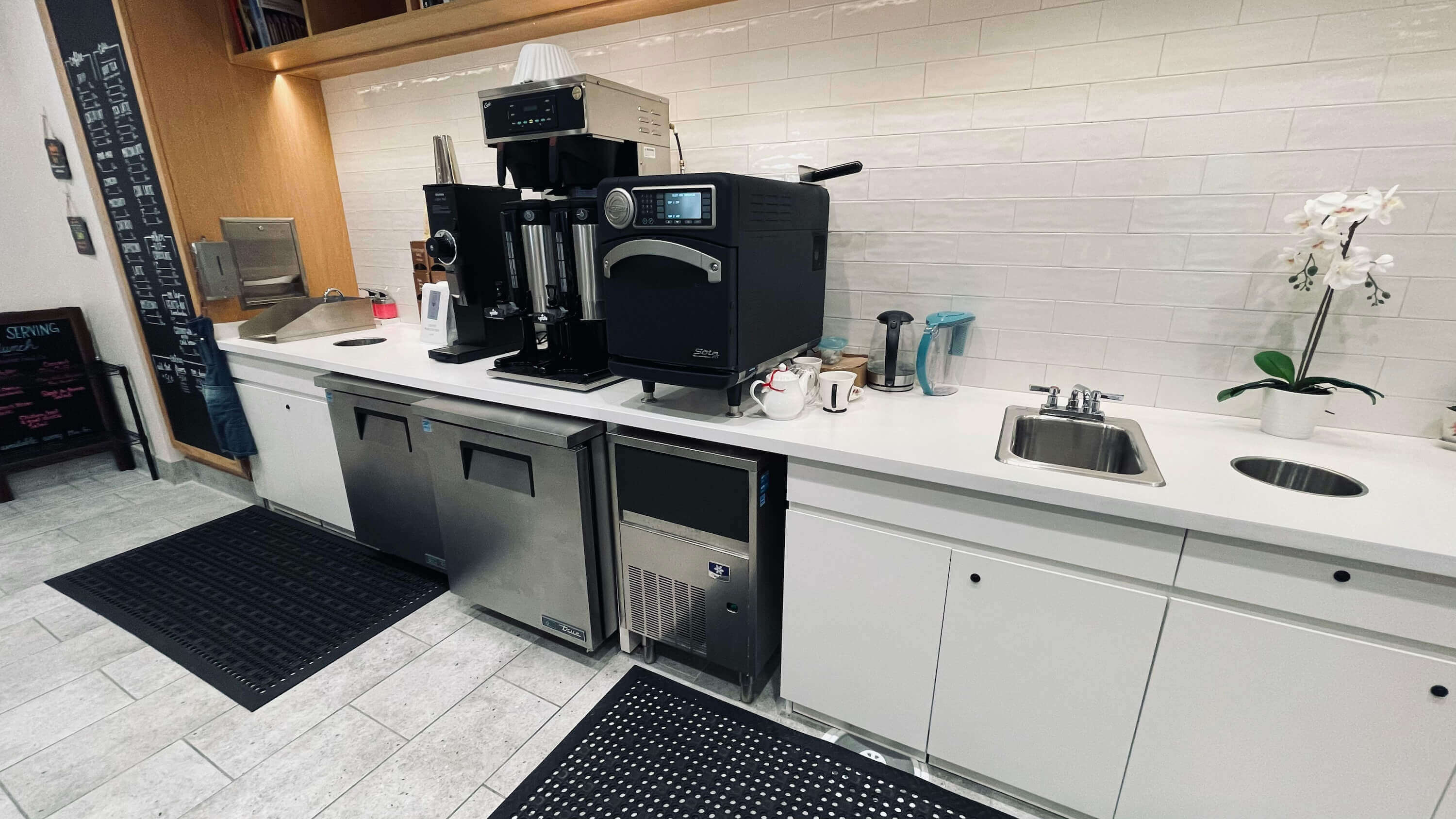 Full kitchen on the Main Floor at 1800 Vine St with commercial equipment and counter space