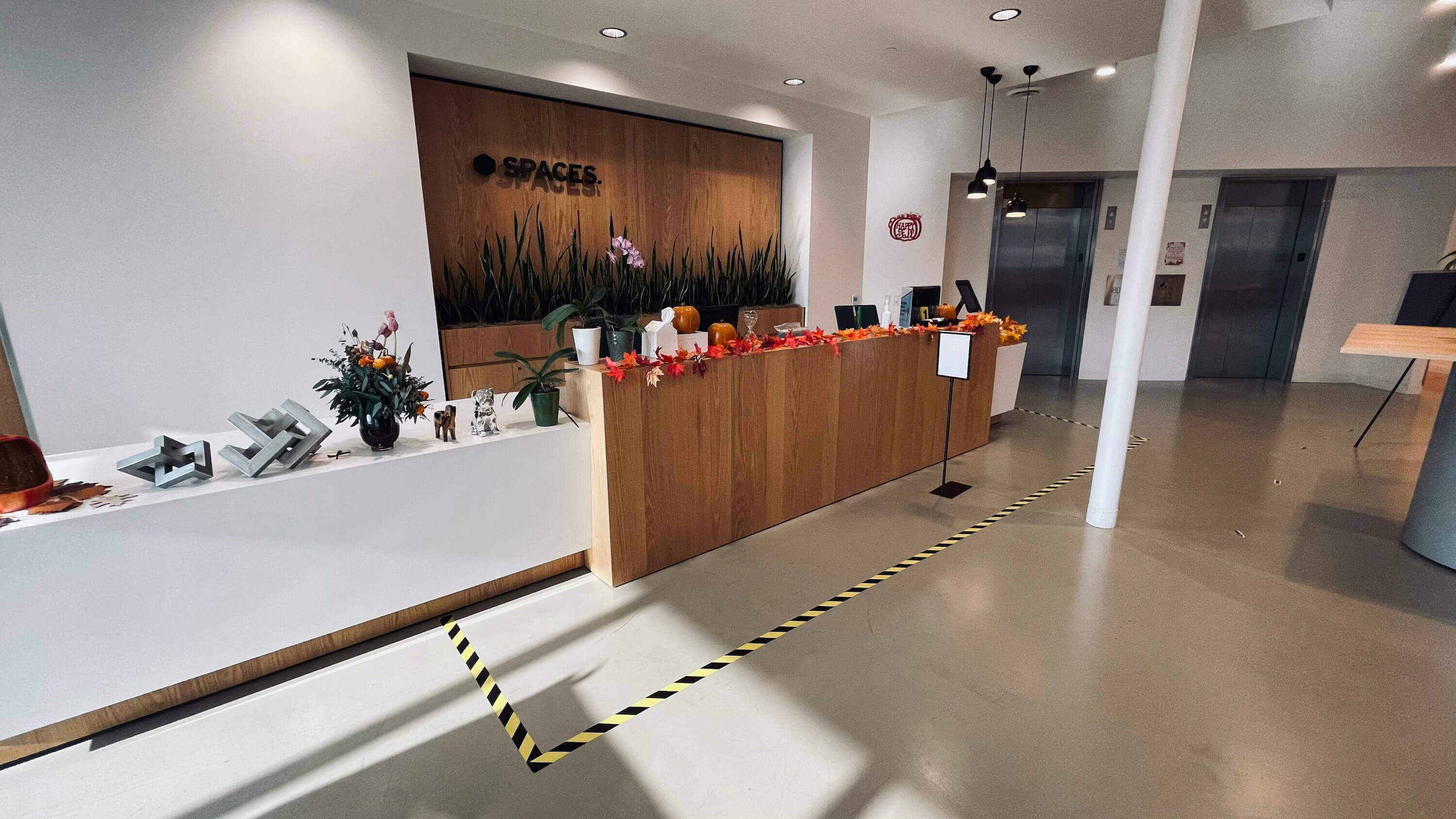 Lobby reception desk on the Main Floor at 1800 Vine St with elevator access