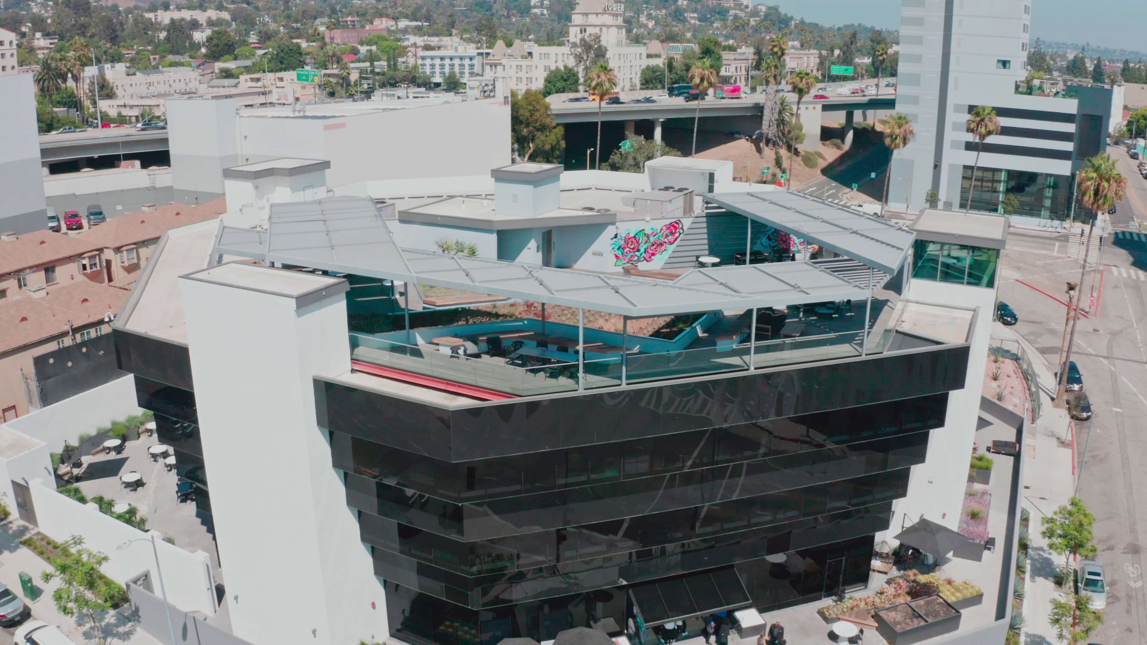 Rooftop terrace at 1800 Vine St with Hollywood Hills and Hollywood sign in background