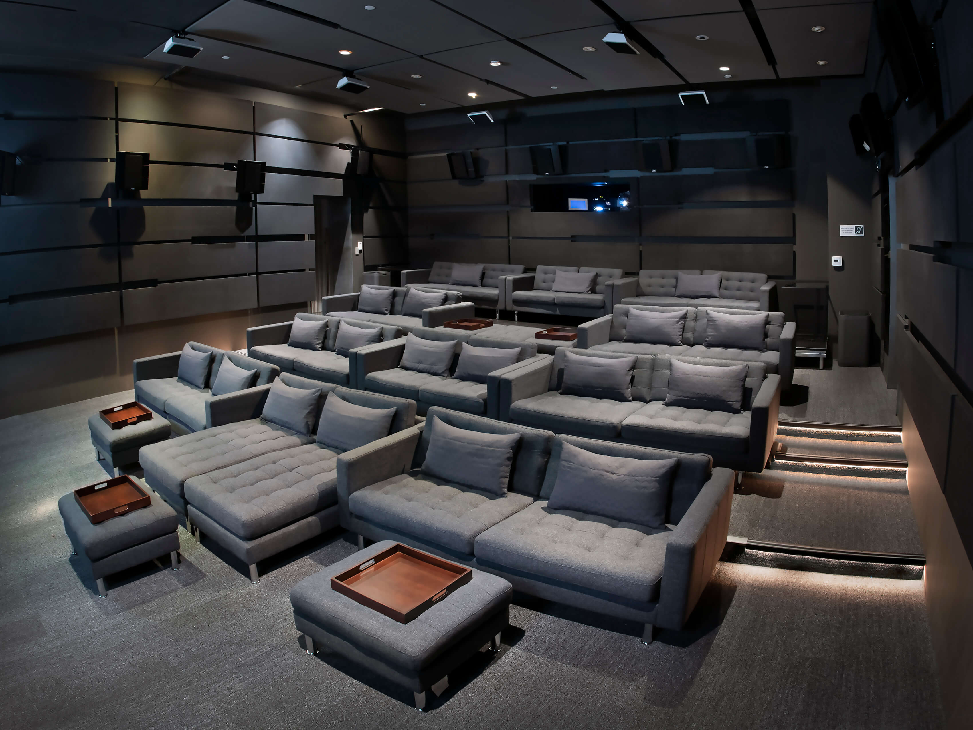 Tiered couch seating inside the Private Theater at 1800 Vine St